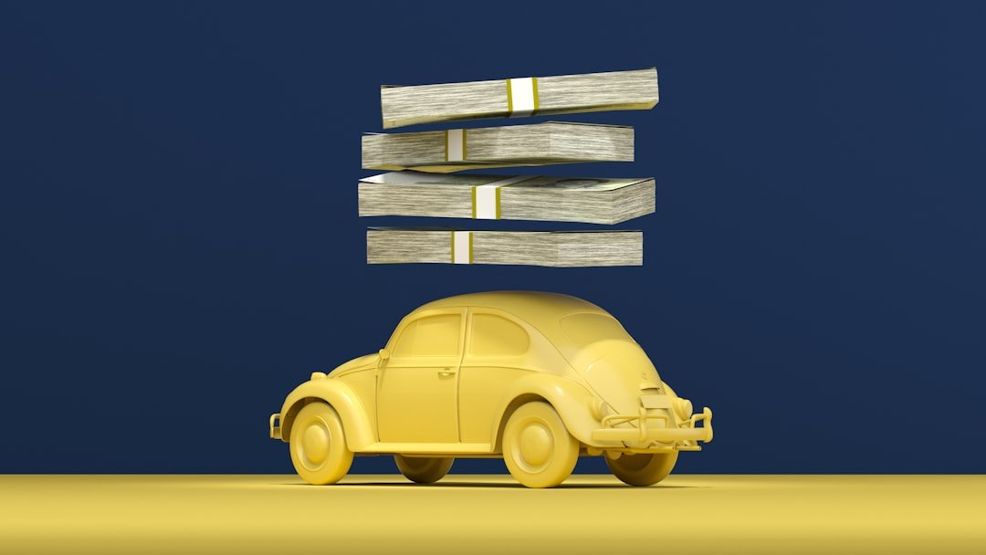 services-10 a-yellow-car-with-stacks-of-money-on-top-of-it-unfmwdamdzc